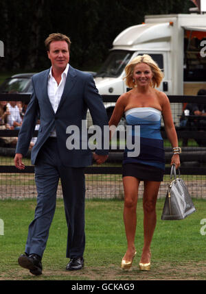 Geri Halliwell arrives with her boyfriend Henry Beckwith at the Cartier International Polo day, held at the Guards Polo Club in the Great Park, Windsor, Berkshire. Stock Photo