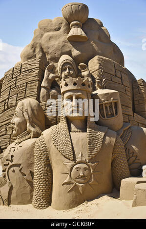 A sculpture of the Monty Python cast from the film the Holy Grail in the Weston-super-Mare Sand Sculpture Festival on the beach, which this year has the theme and celebration of all things British. Stock Photo