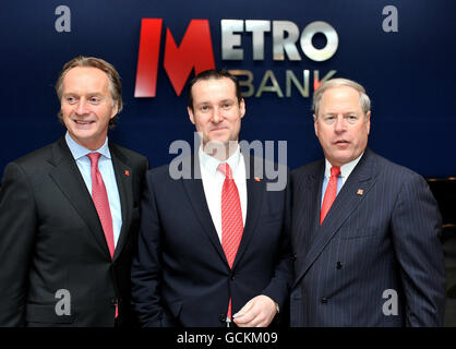 Chairman Anthony Thomson, CEO Craig Donaldson and founder and Vice Chairman Vernon Hill II, stand in the newly opened Metro Bank branch in Holborn, central London. The first high street bank to launch in the UK for more than 100 years opened its doors to customers today but its products received a lukewarm response from industry commentators. Stock Photo