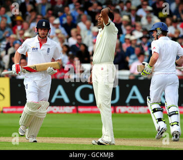 Pakistan's Danish Kaneria reacts as England's Paul Collingwood and Eoin Morgan add runs during day one of the first npower Test match at Trent Bridge, Nottingham. Stock Photo