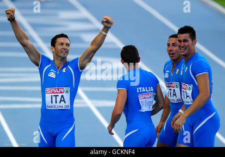 Athletics - IAAF European Championships 2010 - Day Six - Olympic Stadium. The Italian team celebrate their silver medal in the Men's 4x100 relay during the European Athletics Championships, in Barcelona Stock Photo