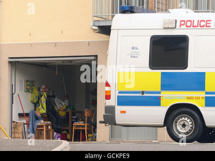 A police van outside buildings on Slateford Road, Edinburgh, after three children were found dead in their home after emergency services were called out to reports of an explosion. Stock Photo