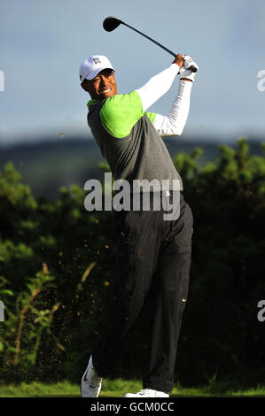 Tiger Woods tees off on the first hole during the third round of the ...