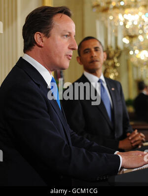 Prime Minister David Cameron holds a news conference with US President Barack Obama, at the Whitehouse in Washington. Stock Photo