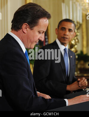 Prime Minister David Cameron holds a news conference with US President Barack Obama, at the Whitehouse in Washington. Stock Photo