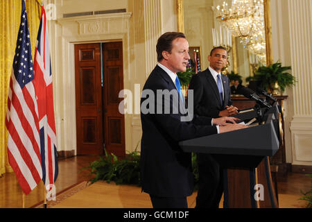 Prime Minister David Cameron holds a news conference with US President Barack Obama, at the Whitehouse in Washington. Stock Photo