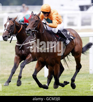 Horse Racing - Betfair Weekend Friday - Ascot Racecourse. Hanoverian Baron ridden by Kieren Fallon (right) wins the Newsmith capital october club charity handicap stakes at Ascot Racecourse, Ascot. Stock Photo