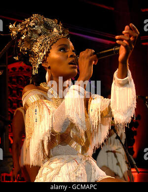Shingai Shoniwa of the Noisettes performing on stage at the Union Chapel in north London. The concert is a warm up show before the band travels to Milawi to take part in the Lake of Stars Festival in October. Stock Photo