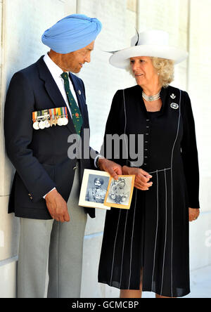 The Duchess of Cornwall talks to a relative of an Indian soldier, commemorated in the Neuve Chapelle First World War memorial, in northern France. Stock Photo