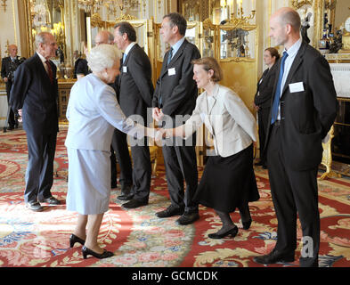 Queen Elizabeth II meets Dame Helen Ghosh as she hosts a reception for winners of the Queen's Awards for Enterprise at Buckingham Palace, London. Stock Photo