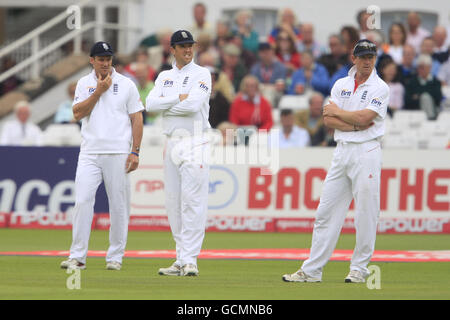 Cricket - npower First Test - Day Three - England v Pakistan - Trent Bridge. England's Andrew Strauss, Graeme Swann and Paul Collingwood (left to right) look on in the field