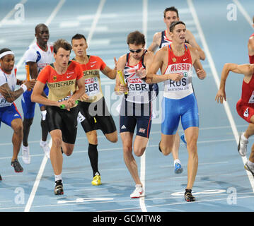 Great Britain's Martyn Rooney tries to squeeze through as Great Britain win a Silver medal in the 4x400m Relay during day six of the European Championships at the Olympic Stadium in Barcelona, Spain. Stock Photo