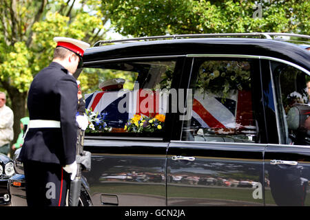 The coffin of Marine Adam Brown at his funeral service at St Peter's Church in Yateley, Hampshire. Stock Photo