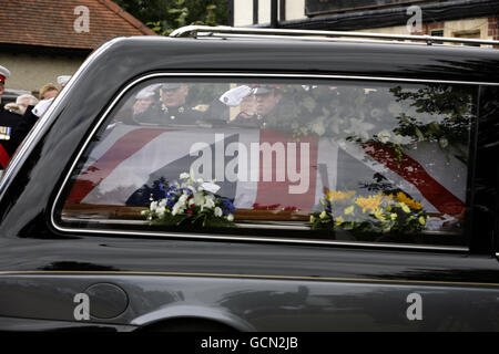 The coffin of Marine Adam Brown at his funeral service at St Peter's Church in Yateley, Hampshire. Stock Photo