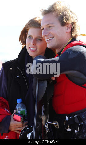 Princess Beatrice with her boyfriend Dave Clark pictured before Sir Richard Branson attempted to set two world records kite-boarding across the English Channel, to celebrate his 60th birthday. Stock Photo