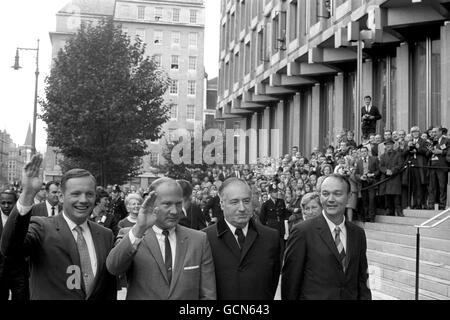Accompanied by the American Ambassador Walter Annenberg, second right, the American astronauts, and the first men to make the Moon trip, Neil Armstrong, left, Edwin 'Buzz' Aldrin, second left, and Michael Collins, on arrival at the American Embassy in Grosvenor Square, London. Stock Photo