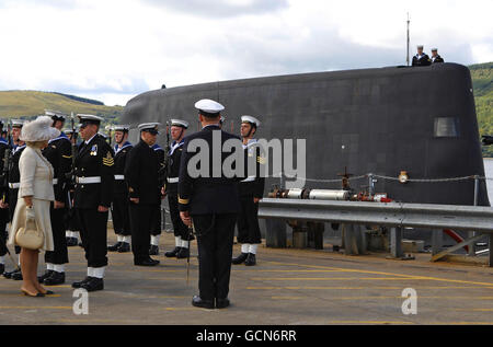 The Duchess of Cornwall inspects the crew of HMS Astute during the commissioning ceremony of the Royal Navy submarine at the Clyde Naval Base near Glasgow. Stock Photo