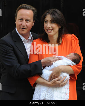 Prime Minister David Cameron and his wife Samantha with their baby daughter Florence Rose Endellion Cameron outside 10 Downing Street, London, following their return to London after their summer holiday in Cornwall. Stock Photo