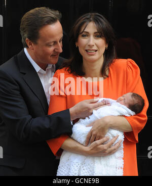 Prime Minister David Cameron and his wife Samantha with their baby daughter Florence Rose Endellion Cameron outside 10 Downing Street, London, following their return to London after their summer holiday in Cornwall. Stock Photo