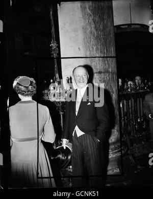 Autumn Budget anxieties are put aside and Chancellor of the Exchequer Mr. Rab Butler smiles broadly as he attends the wedding of his son, Adam Courtauld Butler, to Miss Felicity Molesworth St. Aubyn at St. Martin in the Fields Church, Trafalgar Square, London on October 21st 1955. Mr. Adam Butler, 24, has just returned to London. Stock Photo