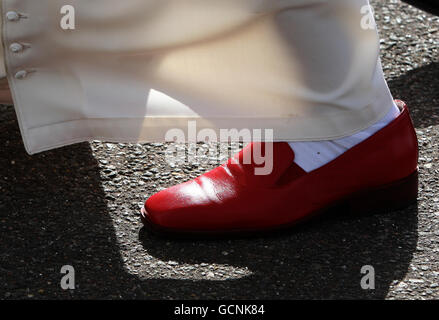 red leather shoes made of human skin