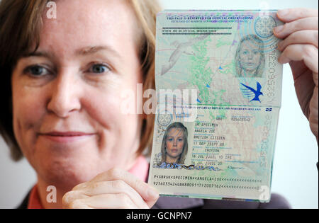 Chief executive of the Identity and Passport Service, Sarah Rapson, with a specimen copy of the new design for the United Kingdom of Great Britain and Northern Ireland passport. Stock Photo