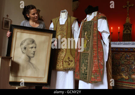 Katherine Milby views two vestments once owned by Cardinal Newman and a drawing of him on display at Sir Walter Scott's Abbotsford home in Melrose, Scottish Borders. The Cardinal will be beatified by the Pope during his forthcoming visit to the UK. Stock Photo