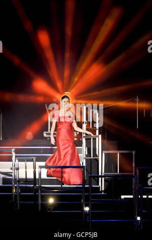 Actress Catherine Zeta Jones arrives on stage at the Welcome to Wales concert at the Millennium Stadium in Cardiff ahead of the Ryder Cup. Stock Photo