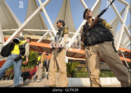 Sport - 2010 Commonwealth Games - Opening Ceremony - Delhi. Armed guards patrol the Jawaharlal Nehru Stadium, in New Delhi, India, ahead of the 2010 Commonwealth Games opening ceremony. Stock Photo