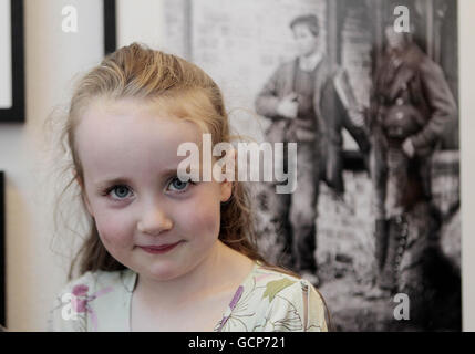 Five year old Grainne Monahan gets a sneak preview of the new major photographic exhibition entitled 'Power and Privilege' giving rare insights into how the other half lived in Big Houses in Ireland during the mid-1800s and early 1900s at the National Photographic Archive in Temple Bar. Stock Photo