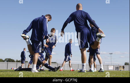 Scotland players warm up during a training session at Strathclyde Homes Stadium, Dumbarton. Stock Photo