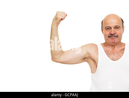 Elderly man shows muscles. keep fit by exercise Stock Photo