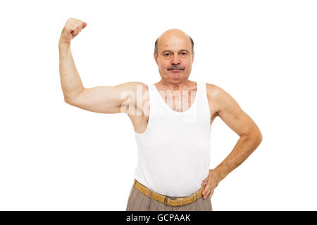 Elderly man shows muscles. keep fit by exercise Stock Photo