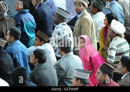 Worshippers attend a service at the Baitul Futuh Mosque, in Morden, Surrey. Stock Photo