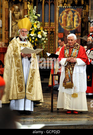 Pope Benedict XVI stands with the Archbishop of Canterbury Dr Rowan Williams during a Celebration of Evening Prayer at Westminster Abbey in central London on the second day of his State Visit. Stock Photo