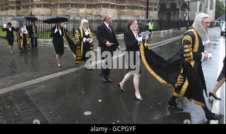 Members of the legal profession make their way from Westminster Abbey to the Palaces of Westminster for the Judges' Procession following the annual service to mark the beginning of the legal year in England and Wales. Stock Photo