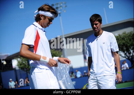 Great Britain's Oliver Golding and partner Czech Republic's Jiri Vesely (left) during day thirteen of the US Open, at Flushing Meadows, New York, USA. Stock Photo