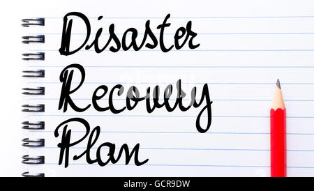 DRP Disaster Recovery Plan written on notebook page with red pencil on the right Stock Photo