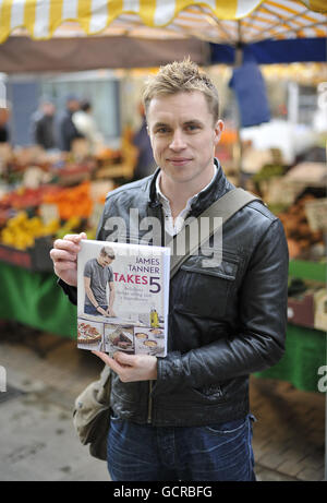 Celebrity Chef James Tanner with his new book 'James Tanner Takes 5' at London's Tachbrook Street market. Stock Photo