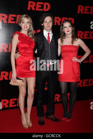 (left-right) Jessica Brown-Findlay, Thomas Howes and Rosie Leslie arriving for UK premiere of Red at the Royal Festival Hall, London. Stock Photo