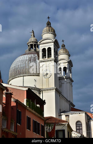 St Mary of the Health apse and belfries with cloudy sky, in Venice Stock Photo