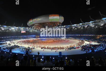 Sport - 2010 Commonwealth Games - Opening Ceremony - Delhi. The Indian team make their way around the stadium during the opening ceremony at the Jawaharlal Nehru Stadium in New Delhi, India. Stock Photo