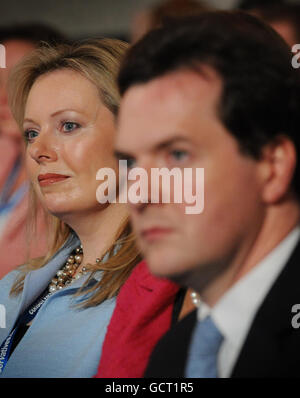 Ffion Hague wife of Foreign Secretary William Hague and Chancellor George Osborne listen to Mr Hague's speech to the opening session of the Annual Conservative Party Conference at the International Convention Centre, Birmingham. Stock Photo