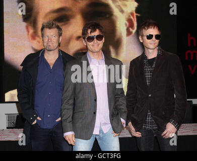 (Left to right) Magne Furuholmen, Morten Harket and Pal Waaktaar of A-Ha during a signing session at HMV Oxford Street, London. Stock Photo