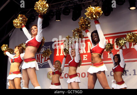 The San Francisco 49ers cheerleaders The Gold Rush perform during London's first ever NFL fan rally in Trafalgar Square, central London, ahead of the NFL game between the San Francisco 49ers and the Denver Broncos tomorrow at Wembley Stadium. Stock Photo