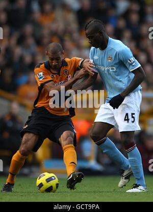 Manchester City S Mario Balotelli Right Is Shown A Yellow Card By