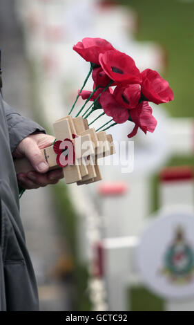 A close up of poppies and remembrance crosses at the opening of the Garden of Remembrance in Edinburgh, ahead of Remembrance Day. Stock Photo