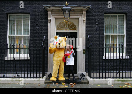 Actress and celebrity mum Lisa Faulkner is joined by BBC's Children in Need, Pudsey Bear to promote BT Chat for Children, outside Number 10 Downing Street in central London. Stock Photo