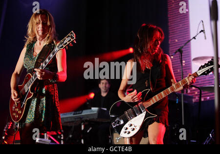 Susanna Hoffs (right) and Vicki Peterson of The Bangles performing during the PINKTOBER charity concert, at the Indigo2 at the O2 Arena in east London. Stock Photo