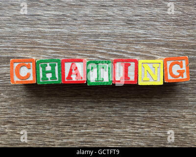 CHATING word written with wood block letter toys Stock Photo